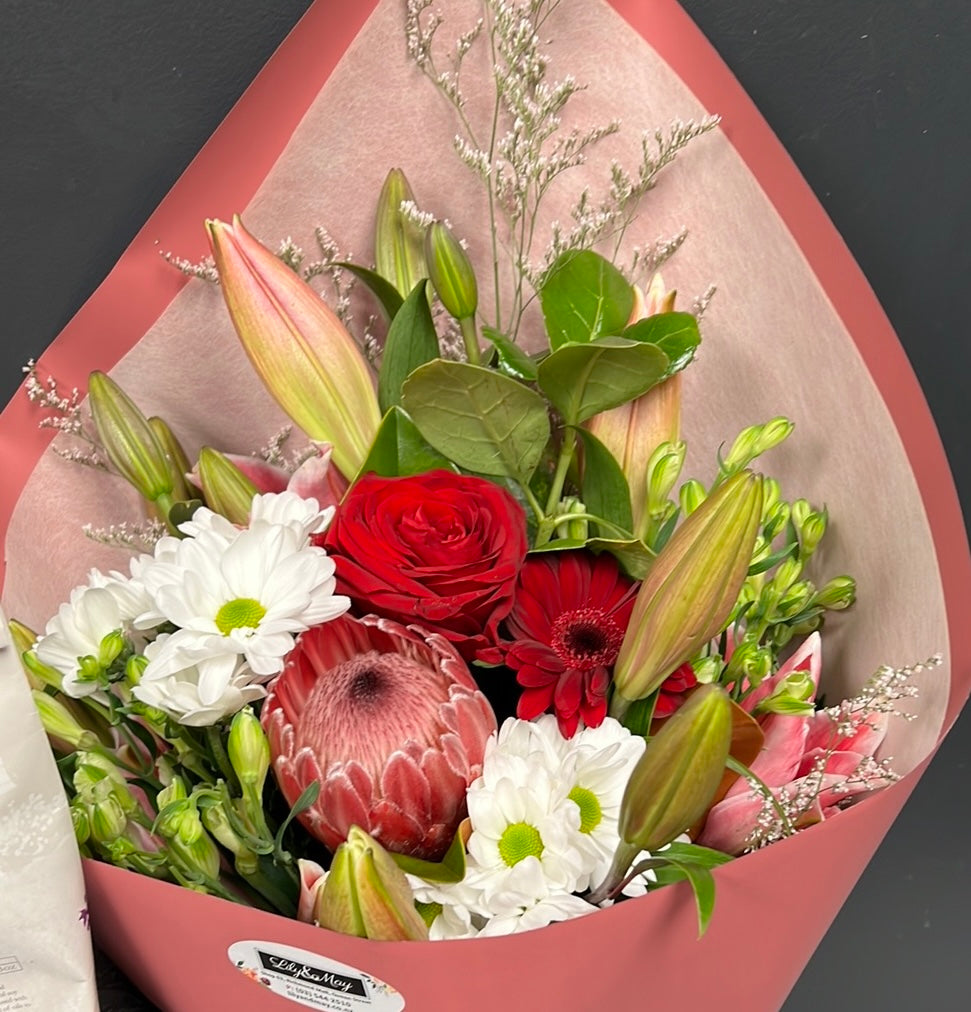 Pastel mix of seasonal flowers