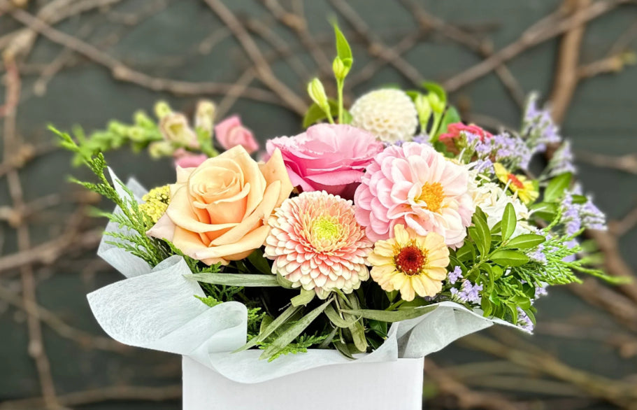 Flower arrangement in posies box